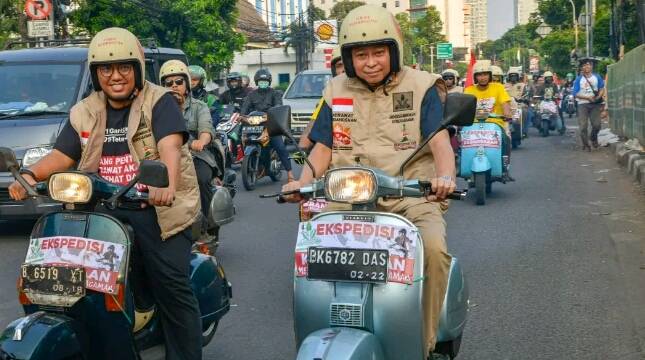 Serukan Semangat Keberagaman, Menteri Jonan Naik Vespa Bersama Pemuda Muhammadiyah