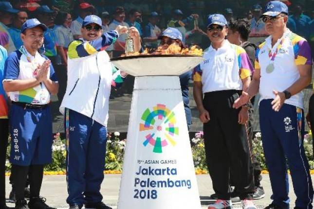 BRI Meriahkan Gelaran Kirab Obor Asian Games 2018 di Denpasar