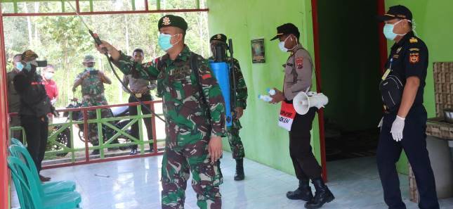 Bersama Lintas Sektoral di Papua, Satgas Pamtas Yonif 411 Kostrad Terus Perangi Virus Corona  