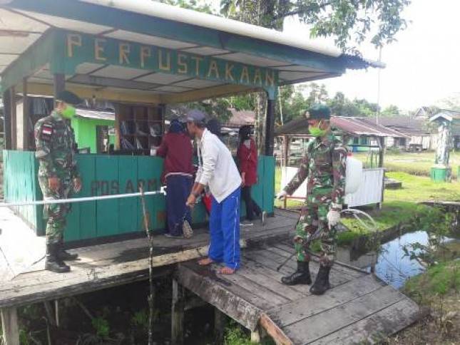 Satgas 754 Kostrad Tegakkan Protokol Kesehatan di Kiliarma Mimika Papua