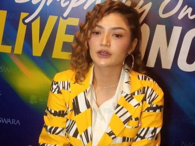 Artis Siti Badriah Plesiran ke Bali Cari Tiket Murah