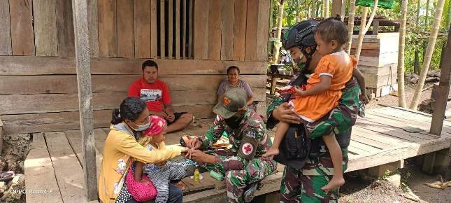 Satgas Yonif 131 Kodam Cedndrawasih Tingkatkan Kesehatan Masyarakat Papua