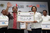 Menteri BUMN Rini Soemarno dan Ketua PWI Margiono (Dok Industry.co.id)