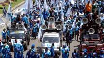 Ilustrasi Demo Buruh (NurPhoto/Getty Images)