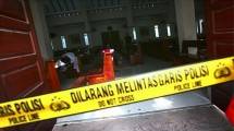 Ilustrasi garis polisi. (Kharisma Tarigan/AFP)