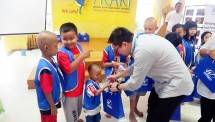 WOM Finance Berbagi Kasih dengan Anak-Anak Pengidap Kanker YKAKI
