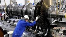 Ilustrasi industri boiler dan turbin. (Norbert Millauer/Getty Images)