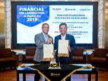 Direktur Ritel dan Menengah Bank BRI Supari dan Co-Founder dan CEO Investree Adrian Gunadi