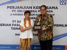 Drektur Marketing PT Delta Mega Persada Lilia Sukotjo dan Direktur Bisnis Ritel BRIsyariah Fidri Arnaldy
