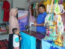 Agen BRILink bertransaksi dengan costumernya