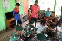 Prajurit Kostrad Perbatasan Berfungsi Sebagai Manteri Sunat 