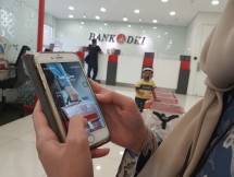 Bank DKI Himbau Penerima BST Gunakan JakOne Mobile