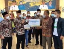 Bupati Tapanuli Tengah & BNI Serahkan Penyaluran KUR Pertanian Padi