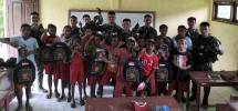Satgas Yonif 126 KC Bagikan Perlengkapan Sekolah 
