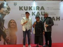 Coach Rheo (Pakai Jaket Putih) 