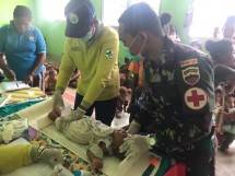 Satgas Yonif 126/KC Bantu Layanan Posyandu di Perbatasan