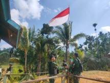 Satgas Yonif 126KC Kibarkan Bendera Merah Putih 