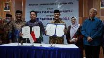 Sekretaris Umum PP Muhammadiyah Abdul Mufti, Menteri Koordinator Bidang Pembangunan Manusia dan Kebudayaan Republik Indonesia Muhadjir Effendy, Direktur Utama Bank Syariah Indonesia Hery Gunardi, Ketua Umum PP Muhammadiyah Haedar Nashir, Ketua Umum Aisyiyah Siti Noordjannah Djohantini, dan Ketua PP Muhammadiyah Anwar Abbas saat acara Penandatanganan Nota Kesepahaman antara BSI dengan PP Muhammadiyah 