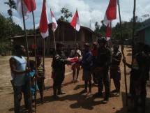 Satgas Yonif 126 KC Kibarkan Bendera Merah Putih Diujung Perbatasan 