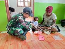 Partisipasi Satgas Pamtas Yonif Raider 142 KJ Dalam Pelayanan Gizi 1000 Hari Pertama Kehidupan