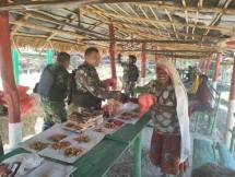 Peran Satgas Yonif Mekanis 203 AK Dalam Meningkatkan Perekonomian Masyarakat Papua