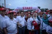 Menteri BUMN Rini Soemarno didamping Dirut PT Telkom Alex J Sinaga (Foto Humas)
