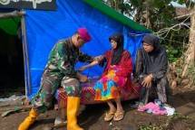 Prajurit Yonkes 1 Marinir Tingkatkan Kesehatan Korban Bencana Cianjur