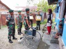 Satgas Yonarmed 1 Kostrad Gelar Aksi Kemanusiaan