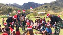 Satgas Yonif Mekanis 203 AK Mensyukuri Datangnya Natal di Distrik Malagayneri dengan Doa Bersama