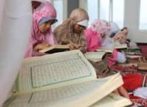 Membaca Alquran-IST