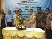Ketua Umum Kadin DKI Jakarta, Eddy Kuntadi bersama Direktur Utama Jamkrida DKI Jakarta, Chusnul Ma'arif