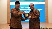 Sekretaris KemenkopUKM Arif Rahman Hakim bersama Ketua Ombudsman Mokhammad Najih