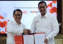 Direktur Bisnis Metranet, Faisal Yusuf (kanan) bersama Direktur Enterprise Business Finnet, Aziz Sidqi usai penandatanganan kerja sama strategis antara Metranet & Finnet untuk peningkatan layanan pembayaran pelanggan Xooply.ID melalui Finpay