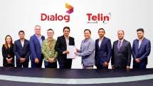 Chief Commercial Officer Telin Kharisma (keempat dari kanan) dan Group Chief Executive of Dialog Axiata PLC Supun Weerasinghe (kelima dari kiri) saat penandatanganan kemitraan strategis untuk pengelolaan layanan terminasi suara dan SMS internasional antara Telin dan Dialog Axiata
