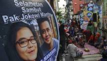 Warga mengikuti acara tumpengan kenduri selamatan sambut pernikahan Kahiyang Ayu dengan Bobby Nasution di Solo, Jawa Tengah, Kamis (2/11/2017). ANTARA FOTO/Maulana Surya 