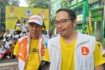 Ketua Panitia Acara &ldquo;Senam Partai 60LKAR&rdquo; sekaligus Bendahara DPD Partai GOLKAR Jakarta Barat, H. Suharto bersama Ketua DPD Partai GOLKAR Jakarta Barat, M. Richard Moertidjaya
