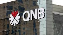 Ilustrasi Bank QNB. (Gabriela Maj/Bloomberg via Getty Images)