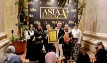 Grand Opening &lsquo;Guinness Asia&rsquo; mengumumkan keberhasilan AIMS meraih pengakuan sebagai &ldquo;Asia Trusted Trading Platform&rdquo; dari Asia Book of Records. 