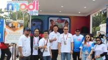 Direktur BRI Life Aestika Oryza Gunarto bersama tim BRI Life di event Telkomsel Digital Run 2026 