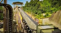 Penerapan teknologi 3D Particle Size Measurement (3DPM) berbasis laser triangulation pada jalur conveyor sebelum material memasuki SAG Mill dan bekerja dengan melakukan pemindaian laser tiga dimensi secara real-time.